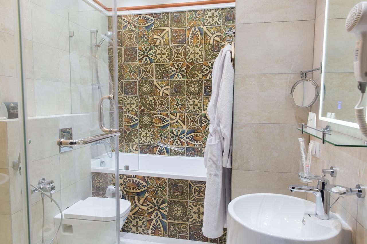 Qonaq Hotel Asztana Kültér fotó