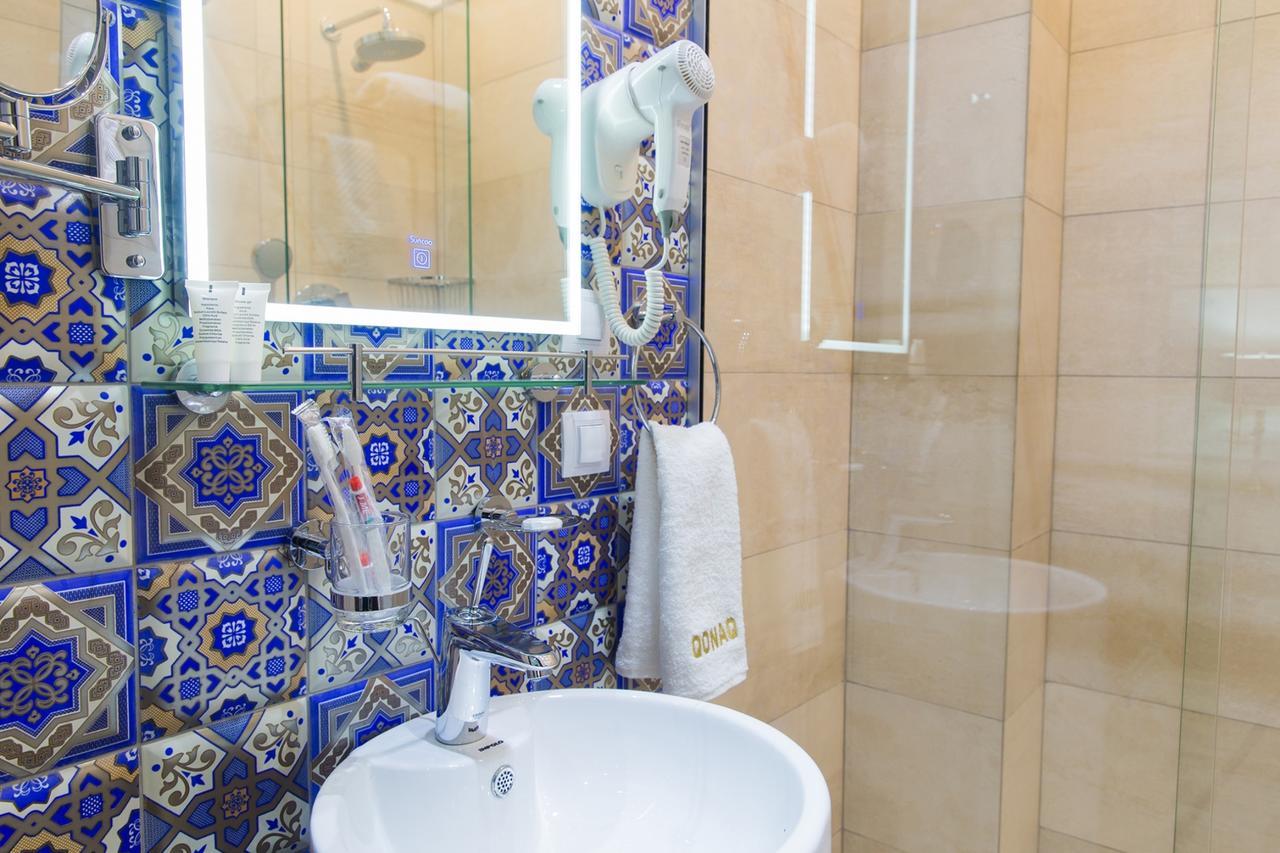 Qonaq Hotel Asztana Kültér fotó